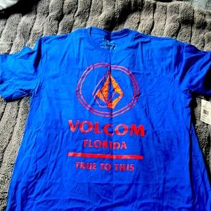3 shirts for $10 

Bright Blue Volcom large shirt - brand new/w tags- large